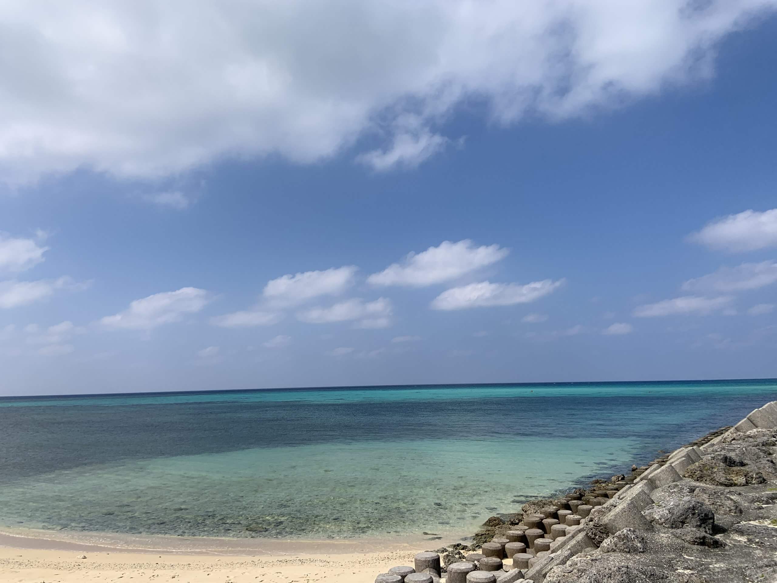 White sand beach and turquoise ocean at Yonaha Maehama Beach in Miyako Island, Okinawa